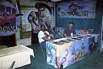 DragonCon 2000. Paul Ruiz and Paul Gerardi in the booth.