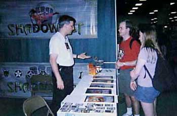 DragonCon 2000. Paul Gerardi at work in the booth.